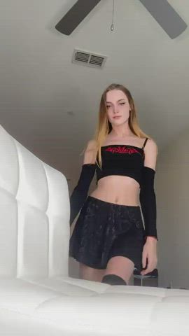 Blonde girl in skirt shows her fresh pussy [GIF]