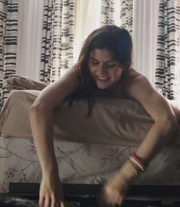 Alexandra Daddario can't even hide her big tits behind her back