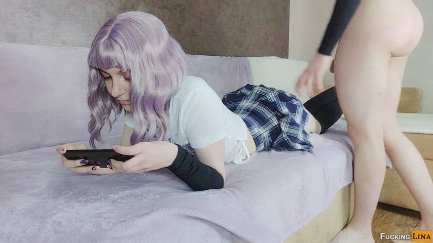She's trying to play phone games