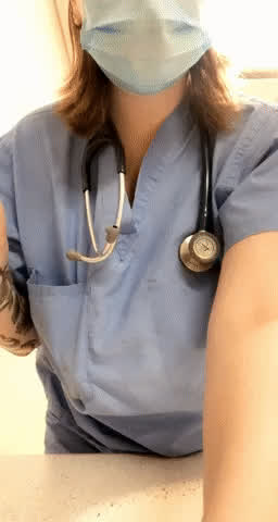 Nurse showing boobs at work