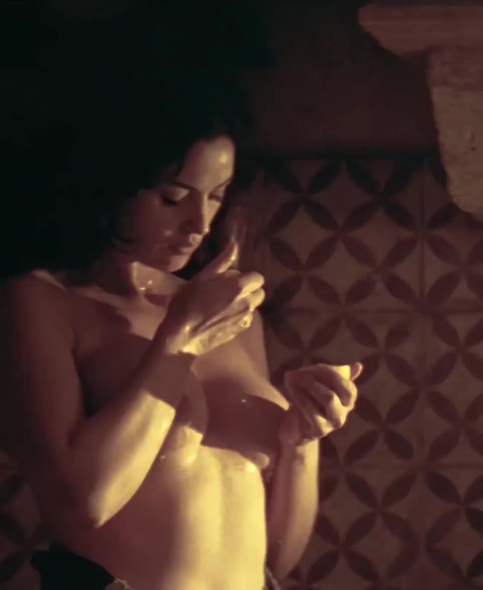 Monica Bellucci Taking Care of Her Tits in Malena (2000)