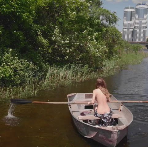 Mila Azul rows a boat in a public park [GIF]